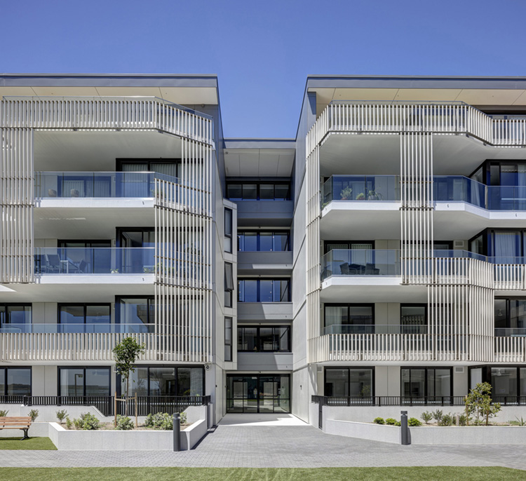 Close-up of terracotta baguettes used on the facade of Anglicare Woolooware Shores.
