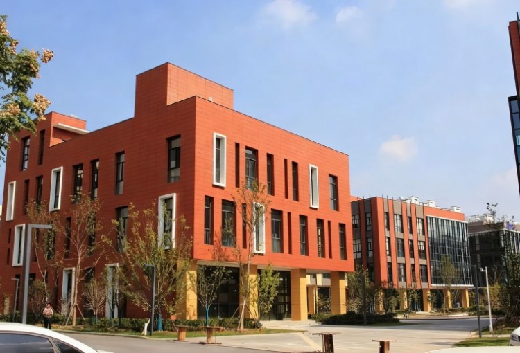 Orange-toned terracotta facade at Nagpur Eco-Tech Campus