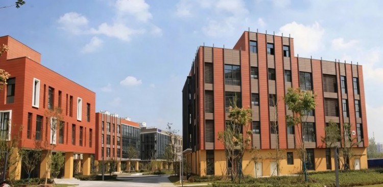 Sunscreen terracotta louvers shading the Nagpur business campus