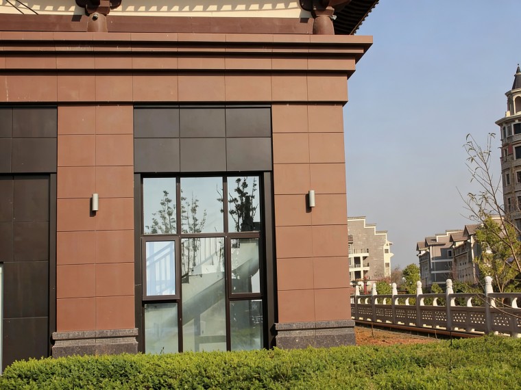 Vertical terracotta elements enhancing facade proportion