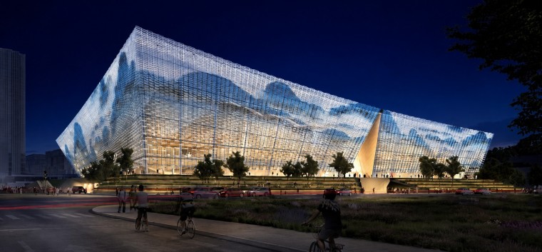 Double-curved facade of Nanchang Poly Grand Theatre with illuminated ceramic fins at night